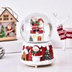 Decoratiune glob cu zapada Embo, Mos Craciun pe casa, diametru 6.5 cm, multicolor - imagine 2
