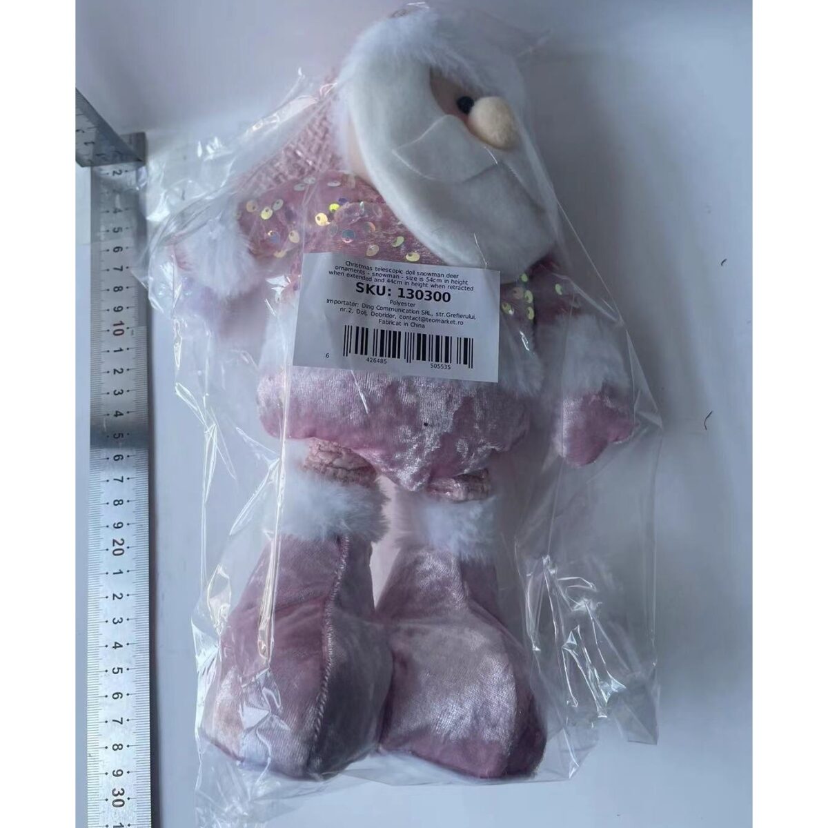 figurina-craciun-flippy-mos-craciun-picioare-telescopice-inaltime-reglabila-44-54cm-roz-66b9f9e2d85cb.jpg Figurina Decorativa, Pentru Craciun, Embo, Mos Craciun, Picioare Telescopice, Inaltime Reglabila 44-54cm, Bluza cu Paiete, Roz - imagine 6