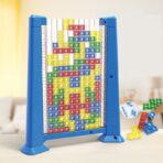 Joc de inteligenta Tetris puzzle tangram Embo, 70 de piese multicolore, 3D, montessori, interactiv, din plastic, zar inclus, sac depozitare piese, varsta peste 6 ani, 23 x 19.8 x 5 cm, cadru albastru - imagine 3