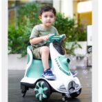 Masinuta electrica cu telecomanda pentru copii, Embo, roti spate rotire 360, curea siguranta, baloane de sapun, lumini si sunete, self control si prin telecomanda, cu pedale de acceleratie si frana, verde - imagine 4