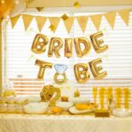 Set Baloane din Folie Metalizata, Embo, Model Bride to Be cu Inel de Logodna, Litere de 40 cm, Baloane Party, Ambalaj Individual, Pai Inclus, Umflare cu Aer sau Heliu, Auriu - imagine 4