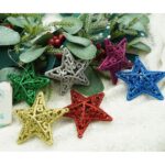 Set de 6 ornamente de brad, Embo, de tip Stea, Multicolor, din plastic, cu finisaj sclipitor , cutie  3  cm adancime x 31  cm lungime x 9  cm inaltime