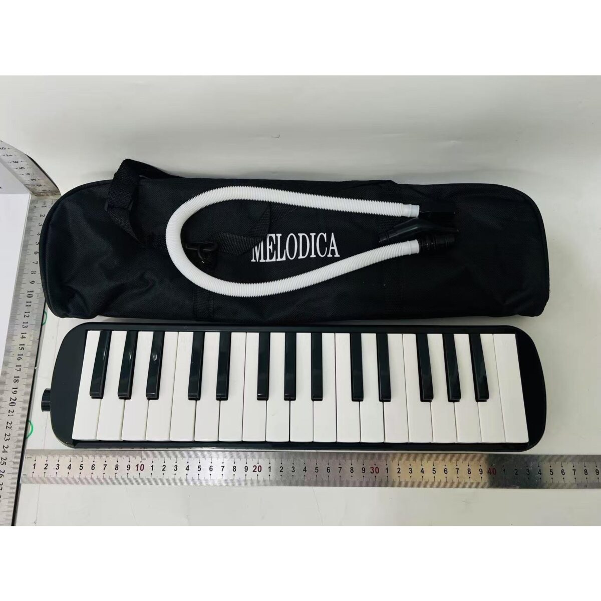 Muzicuta Melodica 32 Clape, Embo, din ABS, pentru Incepatori, 45 x 13 x 7 cm, Include Husa si Suflator, Negru - imagine 5