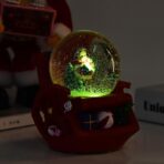 Decoratiune muzicala glob cu zapada, cu lumini si muzica, Mos Craciun, forma scaun, 13 cm, multicolor - imagine 4