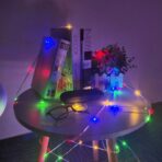 Instalatie de Craciun Yoto, liniara, cu 100 micro LED-uri, 10 m, 220V, conectare la retea, cu 8 jocuri de lumini, interior/exterior, fir transparent, multicolora - imagine 5