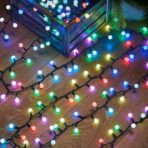 Instalatie de Craciun Liniara RGRB Yoto, 10 m, din care 1 m Prelungitor 220V, 40 LED, Bilute Mate, Interconectabila, Utilizare Interior/Exterior, Fir Negru, multicolor