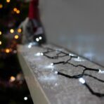 Instalatie de Craciun liniara Yoto, 10 m, din care 1 m cablu priza 220V, 100 LED, 8 jocuri de lumini, controler, fir negru, alb rece - imagine 5