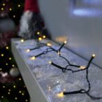 Instalatie de Craciun liniara Yoto, 10 m, din care 1 m cablu priza 220V, 100 LED, 8 jocuri de lumini, controler, fir negru, alb cald - imagine 6