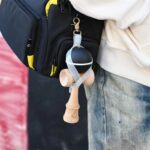 Husa pentru Kendama, Embo, Husa de Depozitare pentru Kendama, din PVC rezistent, Catarama cu Agatare pentru Transportare, Forma Breloc 8, 12 x 6 cm, Alb