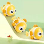 Jucarie mecanica pentru copii Embo, pestisor haios, cu cheita, distractiv, se taraste, se misca, 11 x 9 x 7.5 cm cm, galben - imagine 5