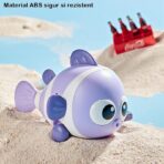 Jucarie mecanica pentru copii Embo, pestisor haios, cu cheita, distractiv, se taraste, se misca, 11 x 9 x 7.5 cm cm, mov - imagine 7