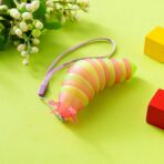 Jucarie Senzoriala Antistres, Embo, Fidget Toys, Omida Tip Breloc, 11 cm, +3 Ani, Roz/Verde - imagine 2